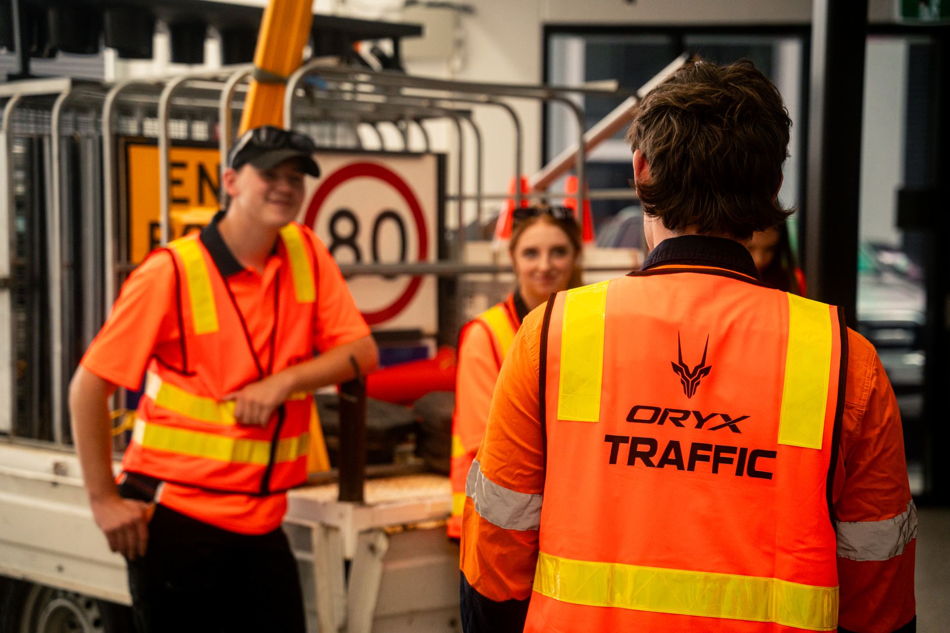 Traffic controllers directing traffic on Melbourne road